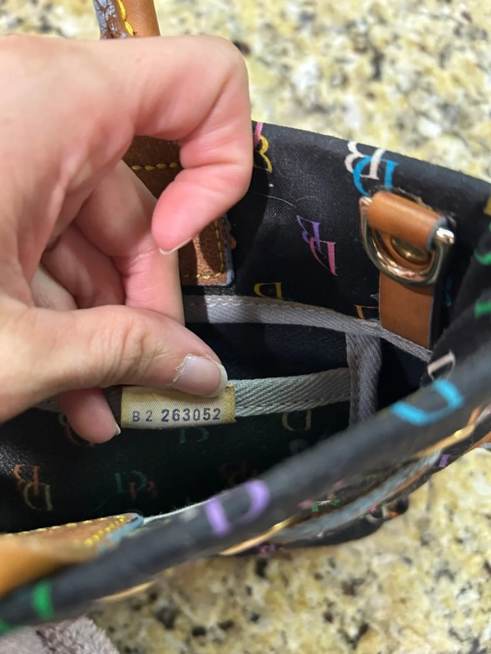 Dooney & Bourke Uncoated Black Multicolor DB Logo Tote with Tan Leather Handles